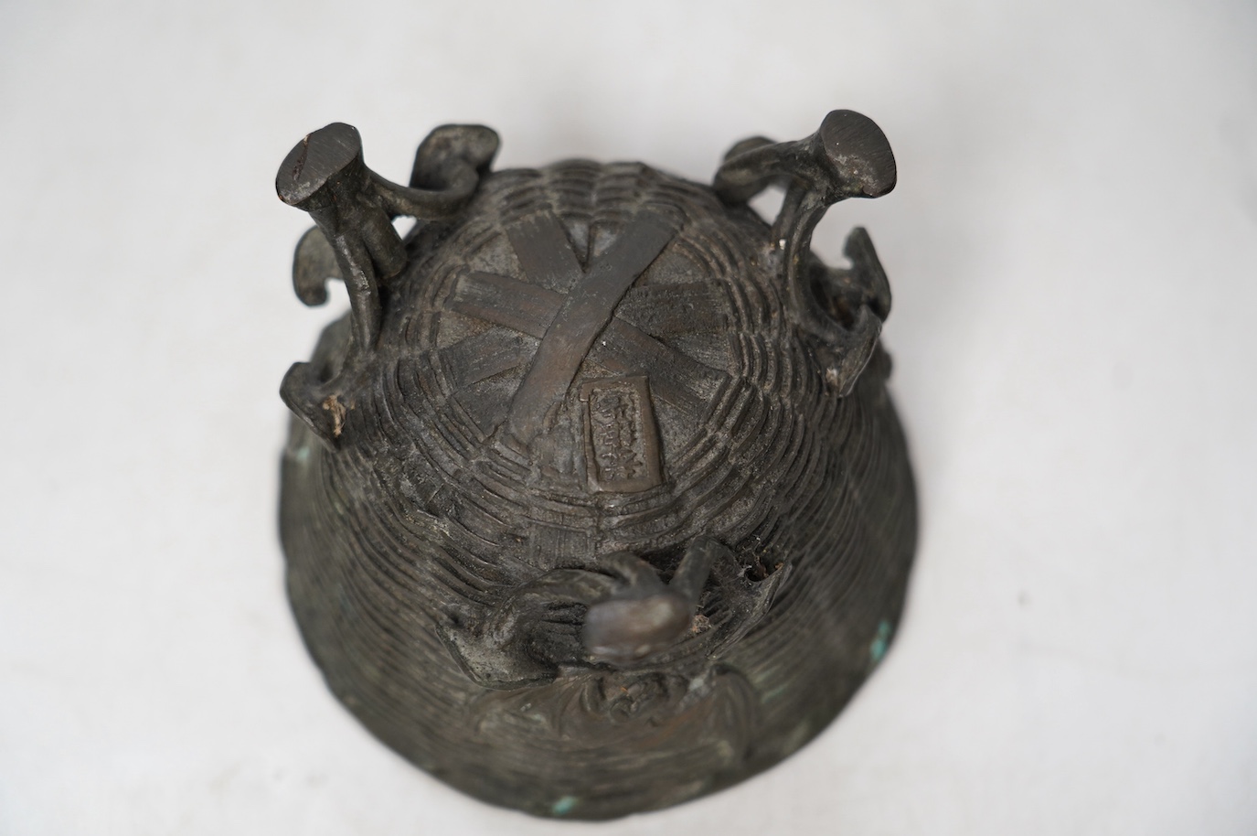 A Japanese bronze tripod censer cast with bats, three character maker’s mark, 12cm in diameter. Condition - fair to good